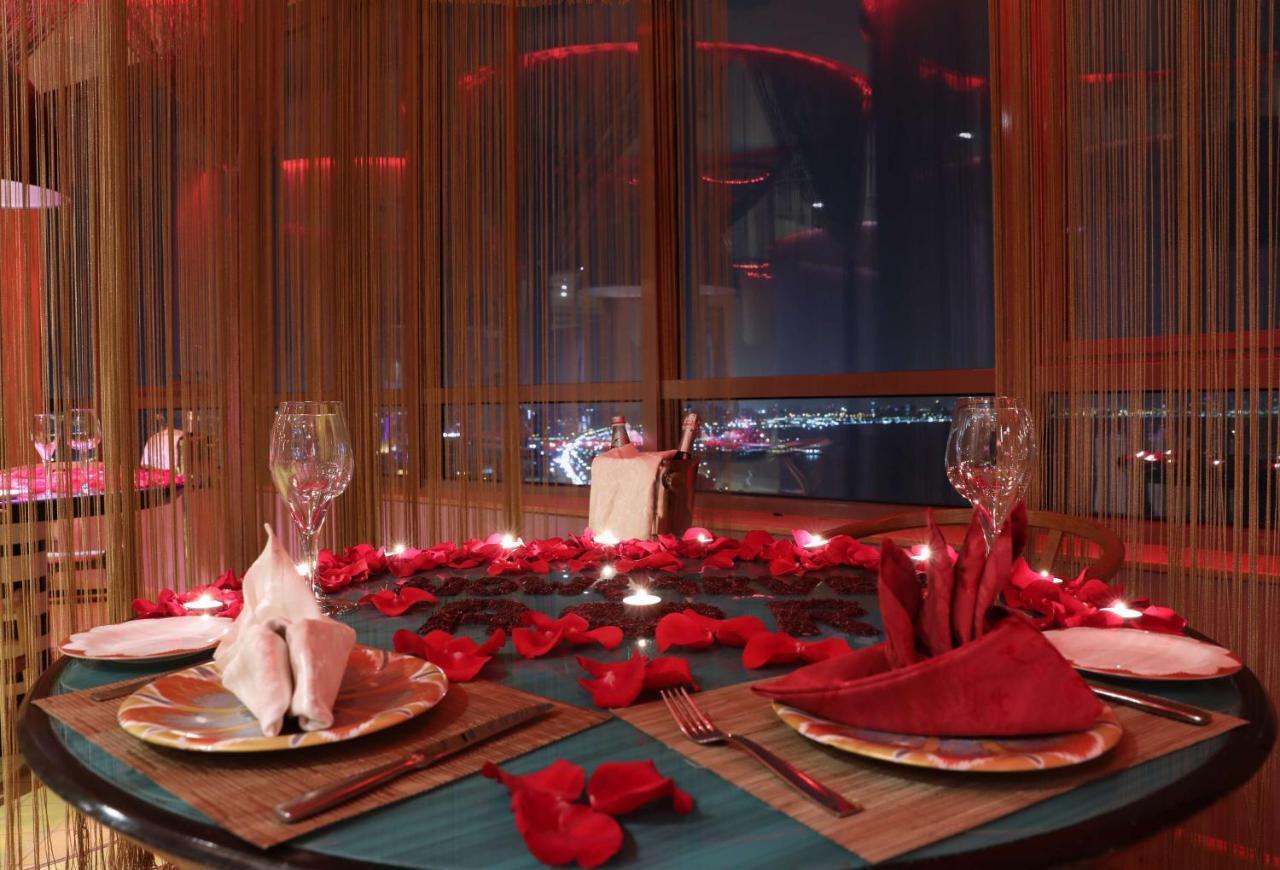Symphony Style Hotel Kuwait Salmiya Exterior foto A table set for a romantic dinner
